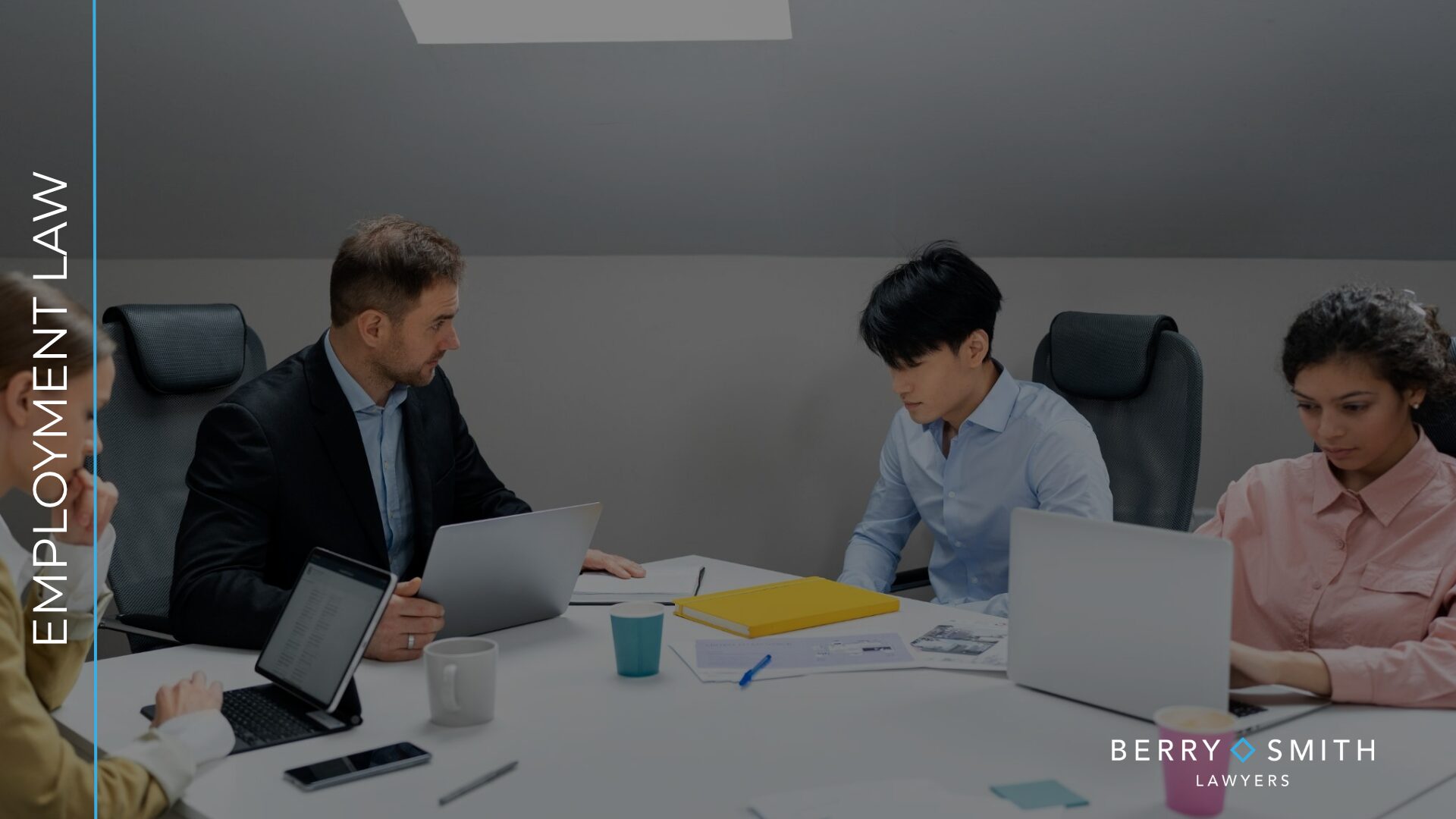 Employee attending a workplace meeting about a performance improvement plan.